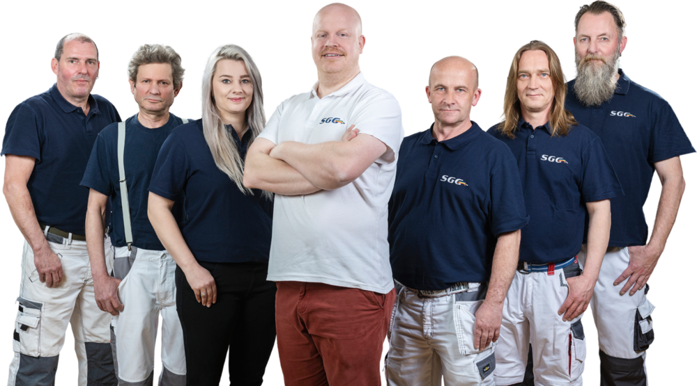 Das komplette SGG-Team: sieben Kolleginnen und Kollegen in Arbeitskleidung